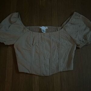 Cropped, puff shoulder, ruffled back detailing top